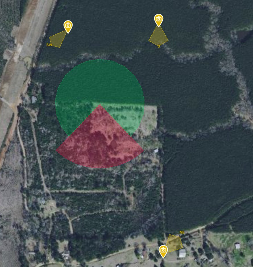 BuckScience wind and scent zone overlay showing green safe zone and red busted zone on satellite map with trail camera field of view cones